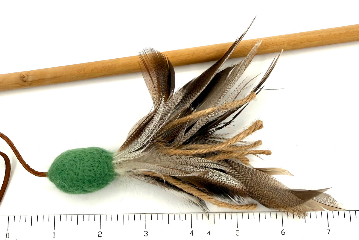 Size of felt and feather bundle on wand toy. 