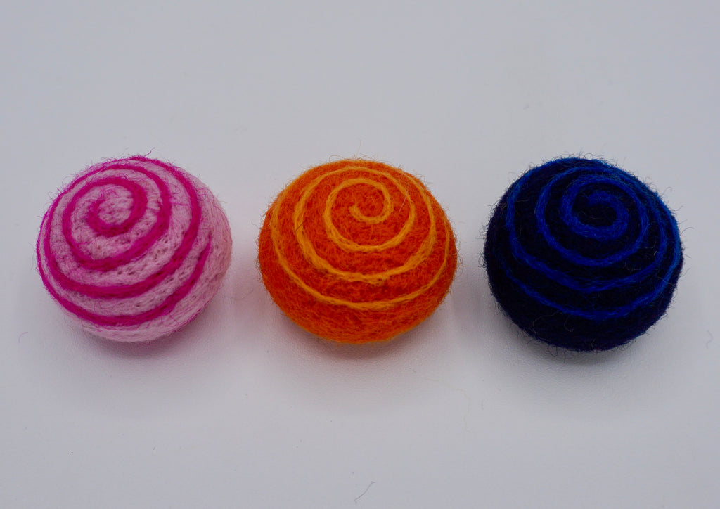 The trio of needle felt swirly cat toys for your favorite feliine. 