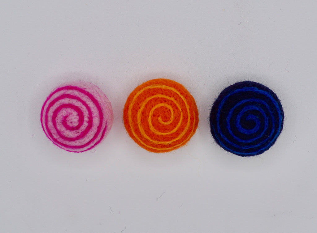 Three swirly toys- look from above. 