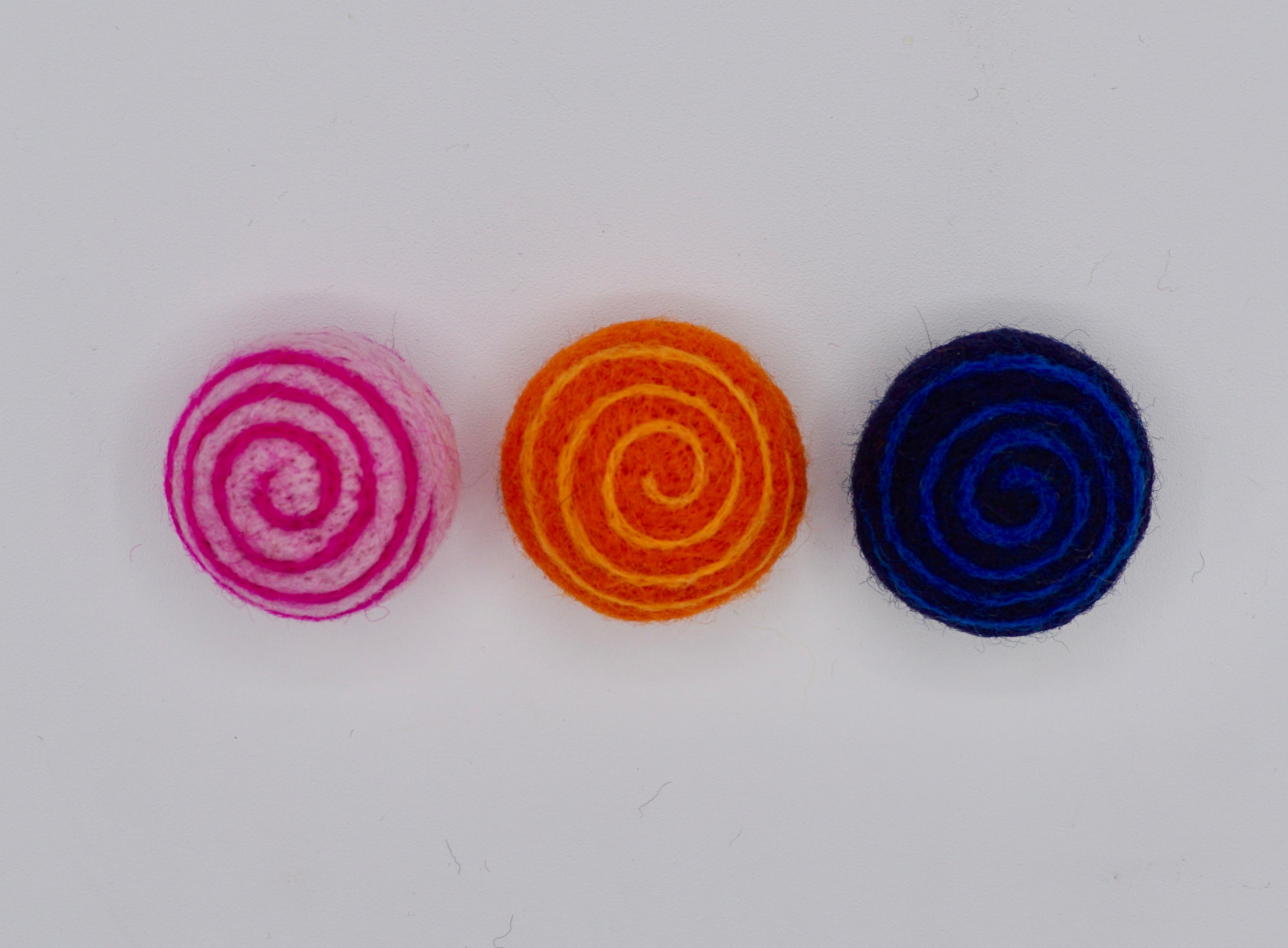 Three swirly toys- look from above. 